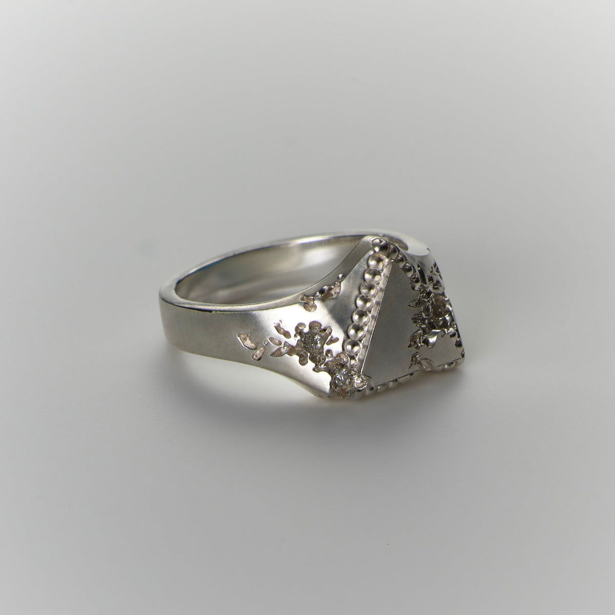 FRACTURED BEADED TRIANGLE