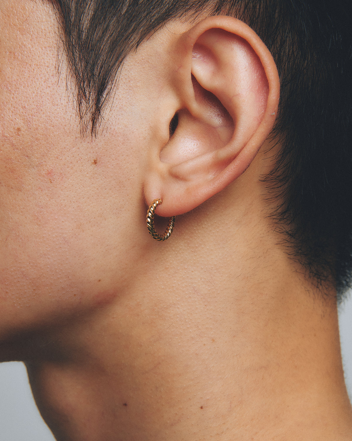 TIGHTLY TWISTED GOLD HOOP EARRING